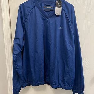 Blue Greg Norman weather essentials golf pullover, brand new with tags.